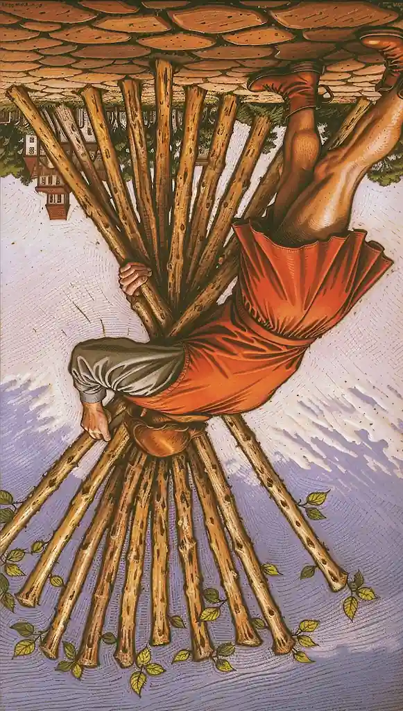 ¿Te Sientes Agobiado? El 10 de Bastos del Tarot Te Dice Qué Hacer 10 de Bastos Invertido en el Tarot